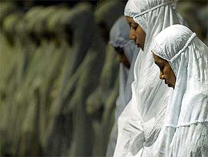 Indonesian Muslims pray together on the eve Ramadan at a mosque in Jakarta 