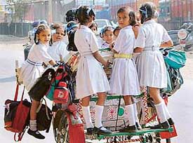 Guess how many students on a rickshaw?