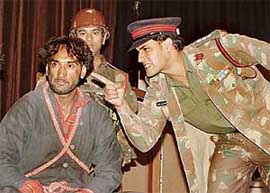 A scene from the play Aprajit