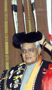 Prime Minister A.B. Vajpayee wears a traditional Naga Headgear  decorated with Hornbills feathers at the dinner hosted by Nagaland Chief Minister Neiphiu Rio at in Kohima on Tuesday.