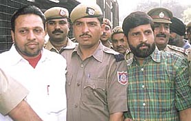 Sushil Sharma and Keshav, accussed in Naina Sahani tandoor case, being produced at Tis Hazari Court in the Capital on Wednesday