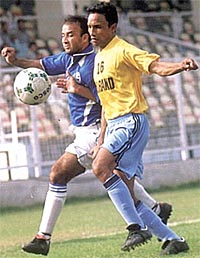 The players of J&K Bank (Srinagar) and Indian Air force (New Delhi) during the Durand Cup Football Tournament 2003 in the Capital on Wednesday. 
