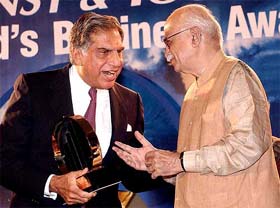 Deputy Prime Minister L. K. Advani  presents the E&Y 'Entrepreneur of the Year' award to noted industrialist Ratan N. Tata at a function in New Delhi 