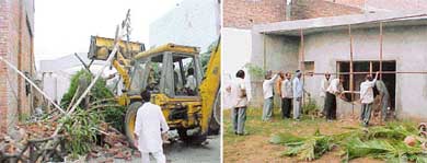 A demolition squad of the Municipal Corporation removes an illegal construction of a marriage palace