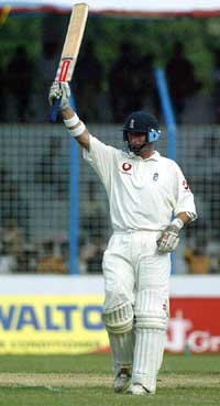 England batsman Nasser Hussain acknowledges the crowd after scoring 50 runs during the third day of the second Test 