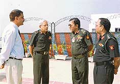 The Chief of Staff, Western Command, Lieut-Gen P.K. Grover (second from left), interacts with military intelligence officers