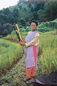 Beya, a farmer from Khasi hills, shows off an indigenously made bamboo tool.