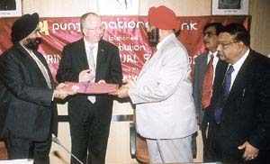 S.S. Kohli, CMD, Punjab National Bank; M.S. Kapur, CMD, Vijaya Bank; and J.M. McCaughan, EVP, Principal Financial Group; launch Principal Mutual Fund products