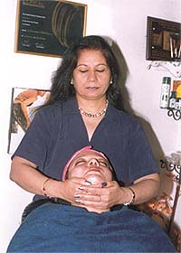 Namrata Makkar gives a client a beauty treatment