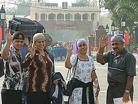 A jatha of NRI devotees crosses over to Pakistan at international Wagah joint check post