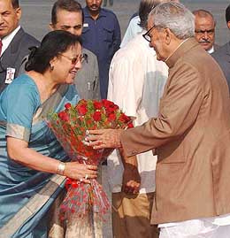 Vice-President Bhairon Singh Shekhwat is greeted by Rajya Sabha Deputy Chairperson Najma Heptullah prior to his departure for Myanmar at Palam Airport in New Delhi on Sunday. 