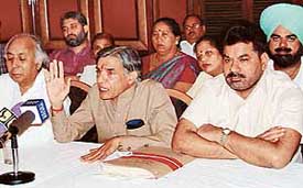 Local MP Pawan Kumar Bansal addresses a press conference