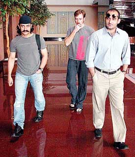 Bollywood actors Amir Khan and Akshay Khanna with a British actor at the muhurat of Ketan Mehata's film Mangal Pande