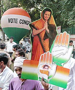 Congress activists with party president Sonia Gandhi's cutout 