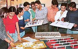 Chandigarh College of Architecture students discuss details of design concepts which they have prepared at the behest of the MC for the revitalisation of underground parking lots in Sector 17.