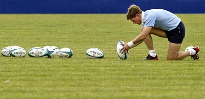 Ireland's flyhalf Ronan O'Gara sets up balls at a team training session in Melbourne
