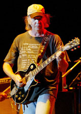 Canadian singer Neil Young performs as part of the Harborfest celebrations in Hong Kong