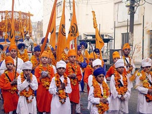 A nagar kirtan being taken out on the eve of the birth anniversary of Guru Nanak Dev