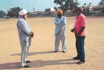 Harbhajan Singh, Ajit Singh and Colonel Balbir Singh (extreme right) at the Sansar Hockey Association playfield.