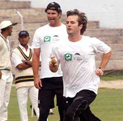 New Zealand's Chris Cairns and Paul Hitchcock train at a practice session at Nehru Stadium in Guwahati 