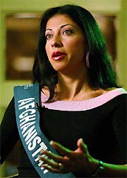 Vida Samadzai, 23, representative from Afghanistan for the 2003 Miss Earth Beauty Pageant, addresses mediapersons in Manila