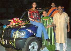 Mr Mukesh Malhotra, a resident of Sector 15, along with family members, who won a Mohindra Scorpio car in the Sector 17 festival lucky draw 