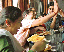 Students share a joke over a dosa break at the Coffee House of Panjab University.