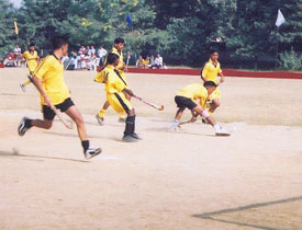 A hockey match in progress on the grounds of Guru Nanak Stadium 