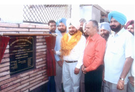 Mr Sadhu Singh Dharamsot, MLA, Amloh, lays the foundation of a rural sewerage system at Mullepur village in Amloh