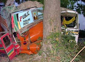 The badly damaged bus and truck which collided near Rampura Phul