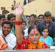 Vasundhara Raje Scindia, BJPs chief ministerial candidate in Rajasthan, waves to her supporters after filing her nomination from Jhalrapatan constituency 