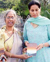 Sushma Sagar (left) and MP Preneet Kaur on the occasion of the release of the former’s collection of poems