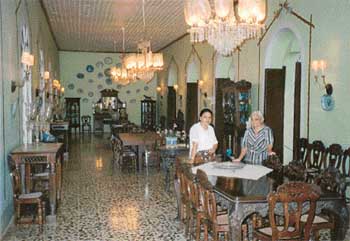 The ambience of the dining hall takes one back to the bygone era