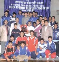 SAI Central Region wrestlers, who won the Inter-Regional Wrestling Tournament held at the Indira Gandhi indoor stadium, with senior SAI officials