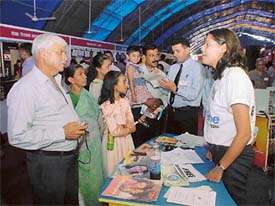 Consumers make inquiries at a consumer trade fair