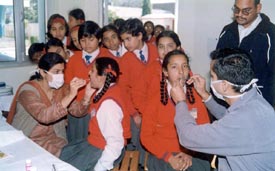 Students of GMT Senior Secondary Public School being examined at a dental check-up camp at the school