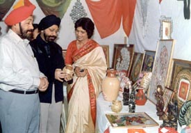 Dr Iqbal Singh Ahuja, a leading gyneacologist, visits art and craft exhibition organised during the Founder's Day celebrations of Gupta Model High School