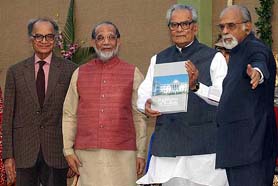 Vice President Bhairon Singh Shekhawat shows "The Book on Raj Bhavan" after  it was released by former Prime Minister I. K. Gujral 