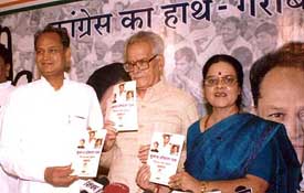 Rajasthan Chief Minister Ashok Gehlot, veteran Congress leader Ram Niwas Mirdha and Rajasthan Congress President Girija Vyas release the Congress manifesto