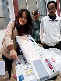 Ms Angela Zothanpuii, in charge of EVMs, gives tips on the use of the machine to election officials in Aizawl 