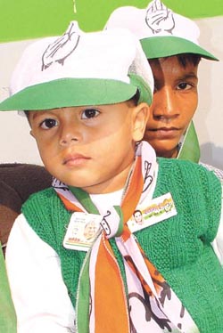 Child campaigners, clad in party colours, ready to hit the road in the Capital