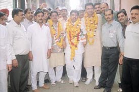 Congress candidate from Tri Nagar Anil Bhardwaj campaigned from