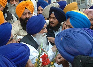 Senior Akali leader Gurcharan Singh Tohra being greeted after his election as SGPC chief for the 27th time in Amritsar on Thursday