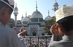 Devotees pray on the last Friday of Ramzan in Amritsar