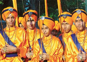 Children dressed as Panj Piaras lead a procession in connection with Guru Teg Bahadur’s Martyrdom Day in Chandigarh