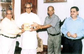 Vice-President Bhairon Singh Shekhawat receiving the first copy of the book on acupressure, 'Miraculous effects of acupressure', authored by Dr L. C. Gupta and Dr A. K. Saxena in the Capital.