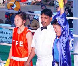 Marry Com of India (R) in a cheerful mood after winning the gold medal in the 46 Kg weight category at the 2nd Asian Women Boxing championship in Hisar