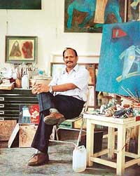 Famous painter Jai Zharotia, also Head, MFA, Delhi College of Art, enjoys the company of art works, while on his visit to Chandigarh