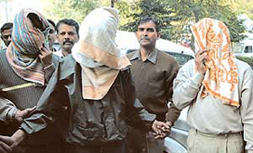 Three persons arrested by the CBI in connection with the leakage of CAT papers in New Delhi on Sunday.