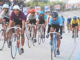 Cyclists take part in the Hero Challenge National Track Cycling Championship at the Punjab Agricultural University